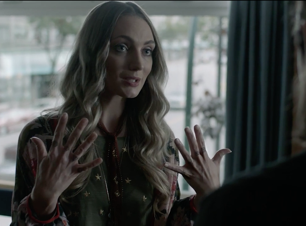 Hannah Levien as Victoria showing all ten digits of her fingers