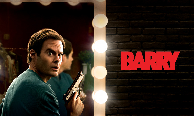 Barry Holding a Gun in front of a dressing room mirror. His name Titles to the right of him.