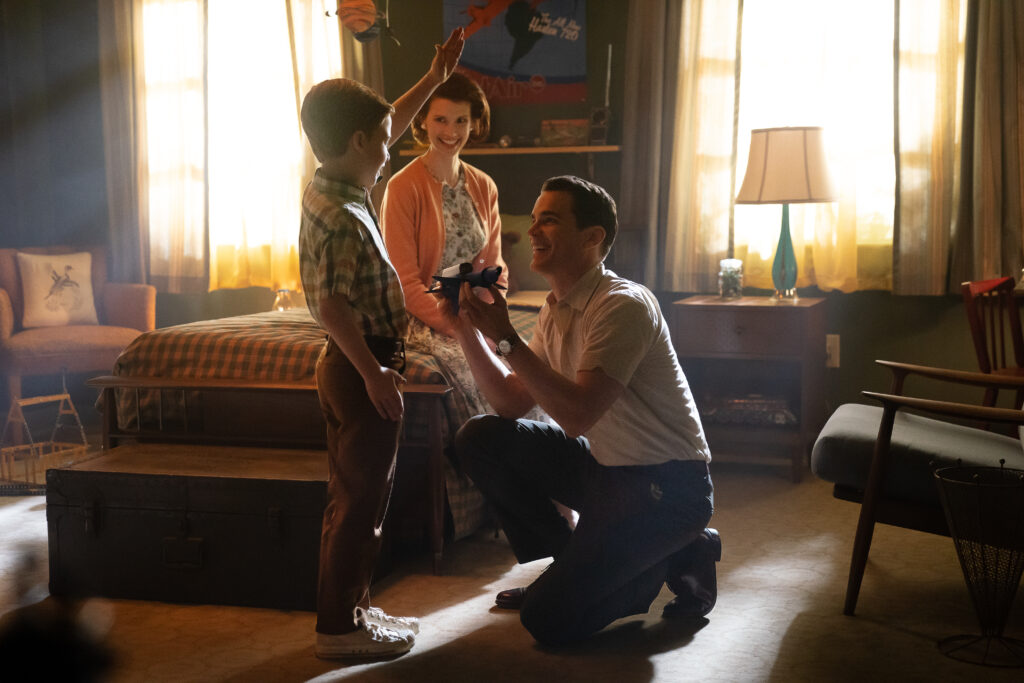 Matt Bomer as Larry Trainor talking to his son, Gary, in front of his wife.