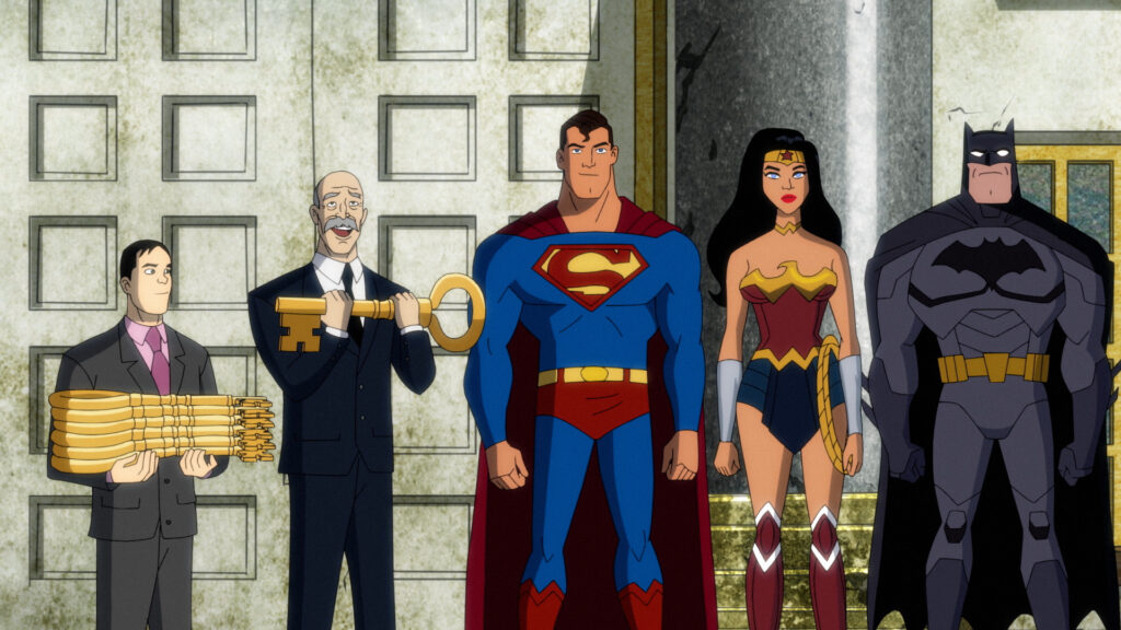 Left to Right: the mayor's aide holding six keys to the city, the mayor holding one key, Superman, Wonder Woman, and Batman.