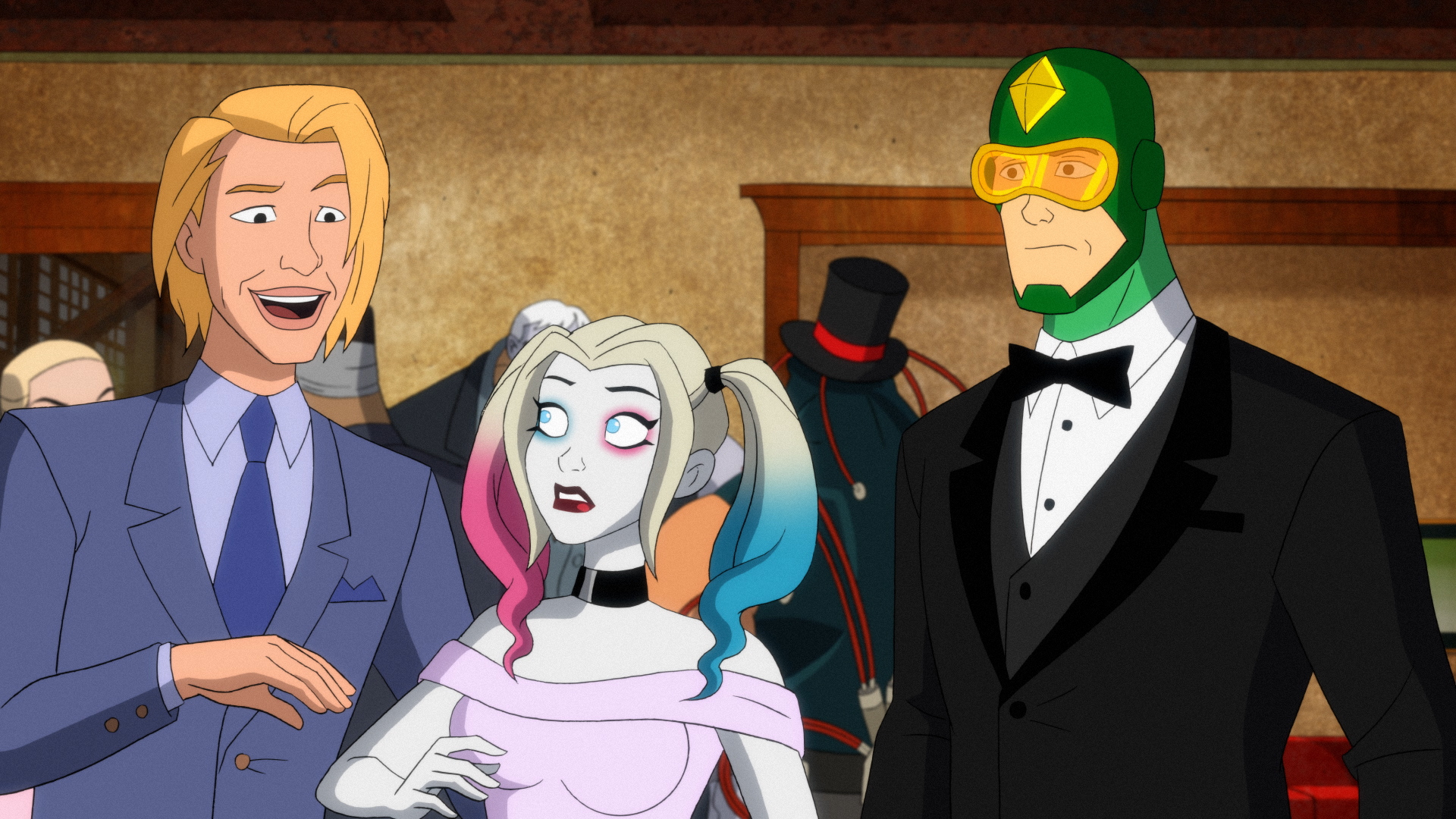Left to Right: Wedding Photographer, Harley Quinn in a dress, and Kite Man in a tuxedo.
