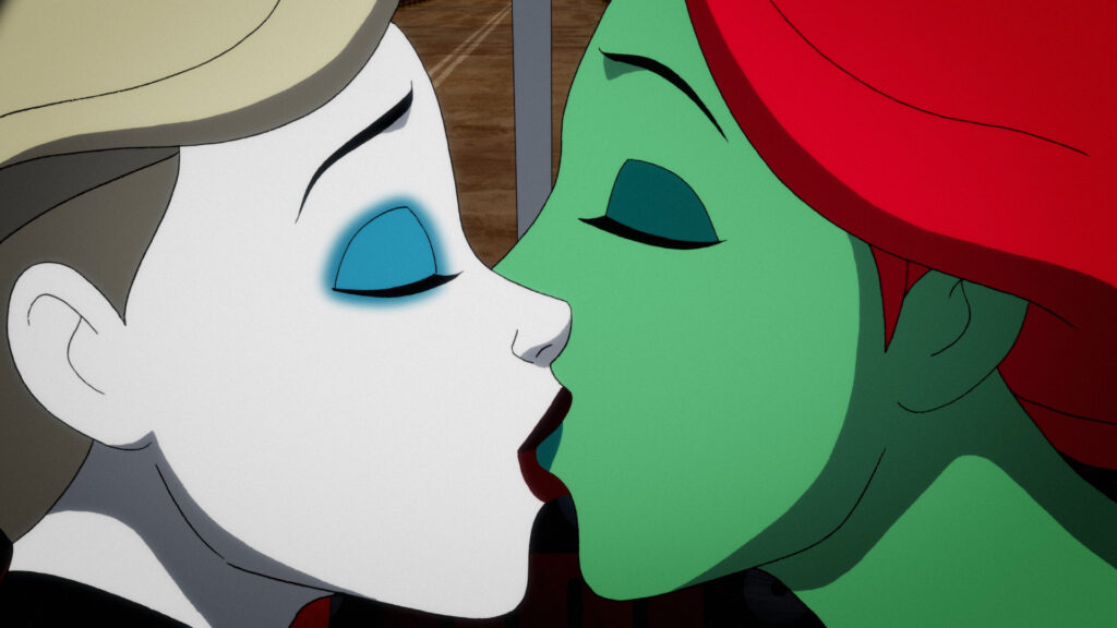 Harley Quinn and Poison Ivy sharing a kiss.