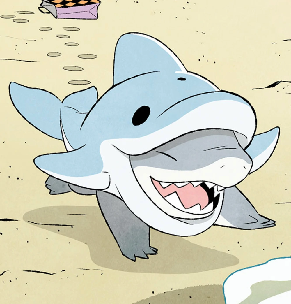 jeff the landshark dressed as a dolphin on the beach