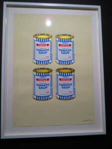 Soup Can (Quad) by Banksy. Silkscreen print of four Tesco Value Tomato Soup Cans modeled after Andy Warhol’s iconic images