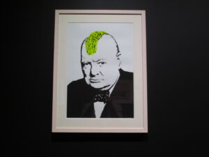Turf War by Banksy. Silkscreen print of Winston Churchill sporting a green punk mohawk