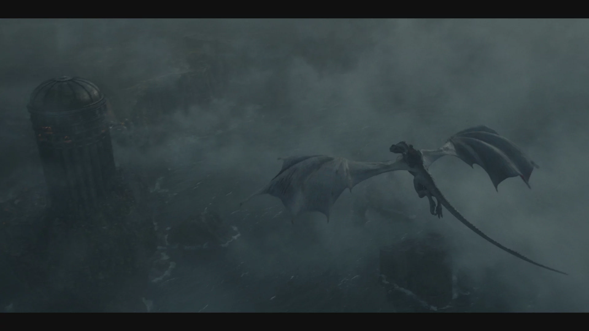 A dragon flies over the clouds setting an ominous tone in house of the dragons episode 10