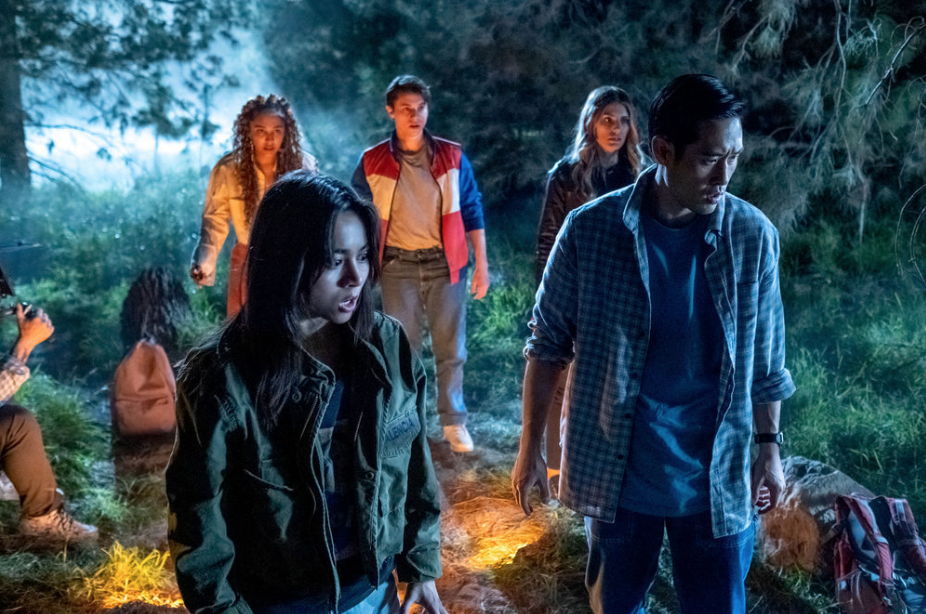 Ben, Addison, and the teens look concerned in the woods at night